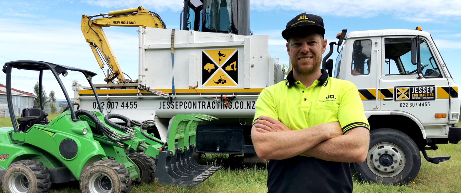 Image showing Philip Jessep, of Jessep Contracting, standing in front of his branded truck and other machinery.